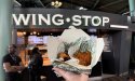 Wat maakt de chicken wings van Wingstop wereldwijd zo populair? 