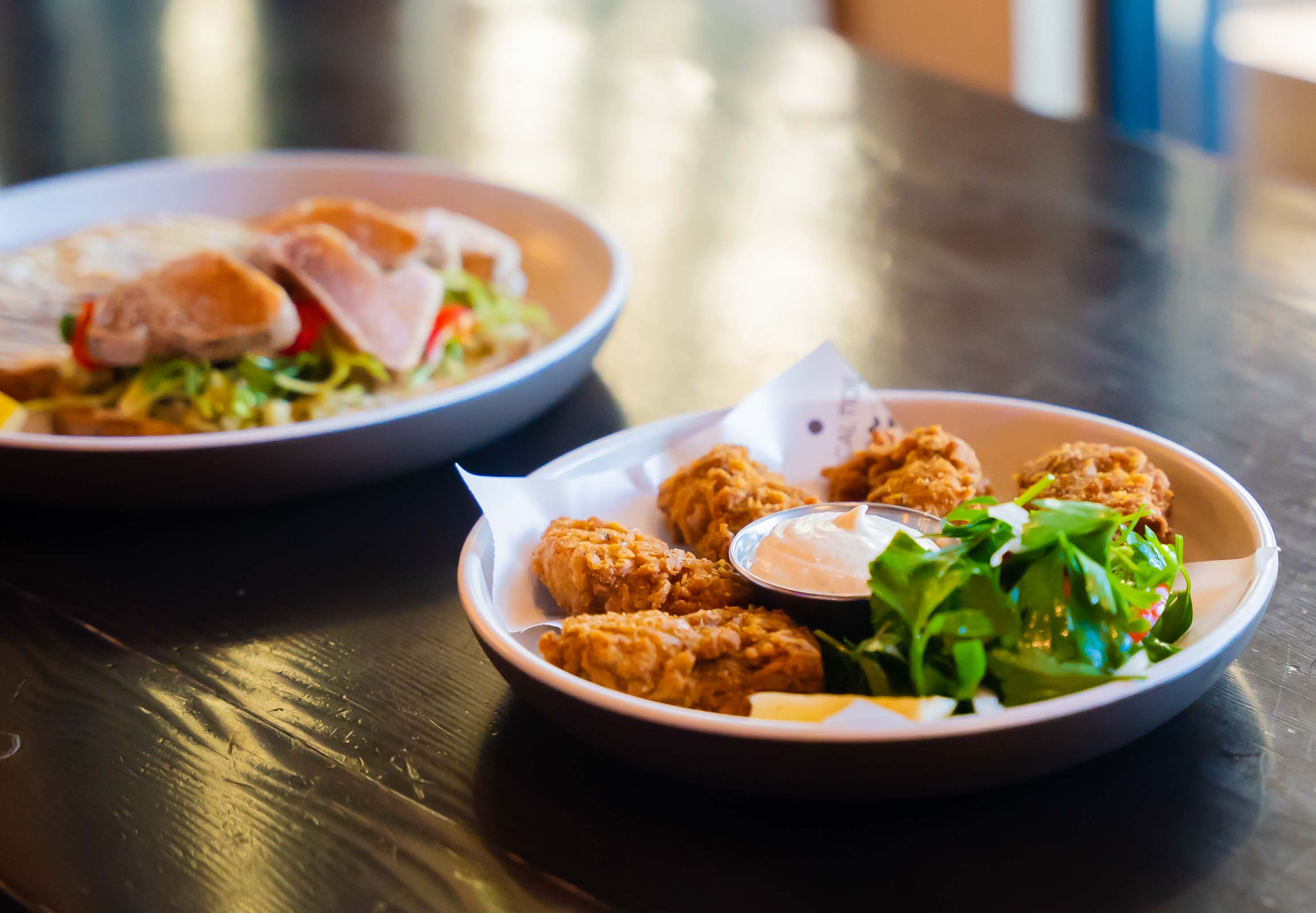 Local Tide: A casual dining restaurant serving fish with a vibe