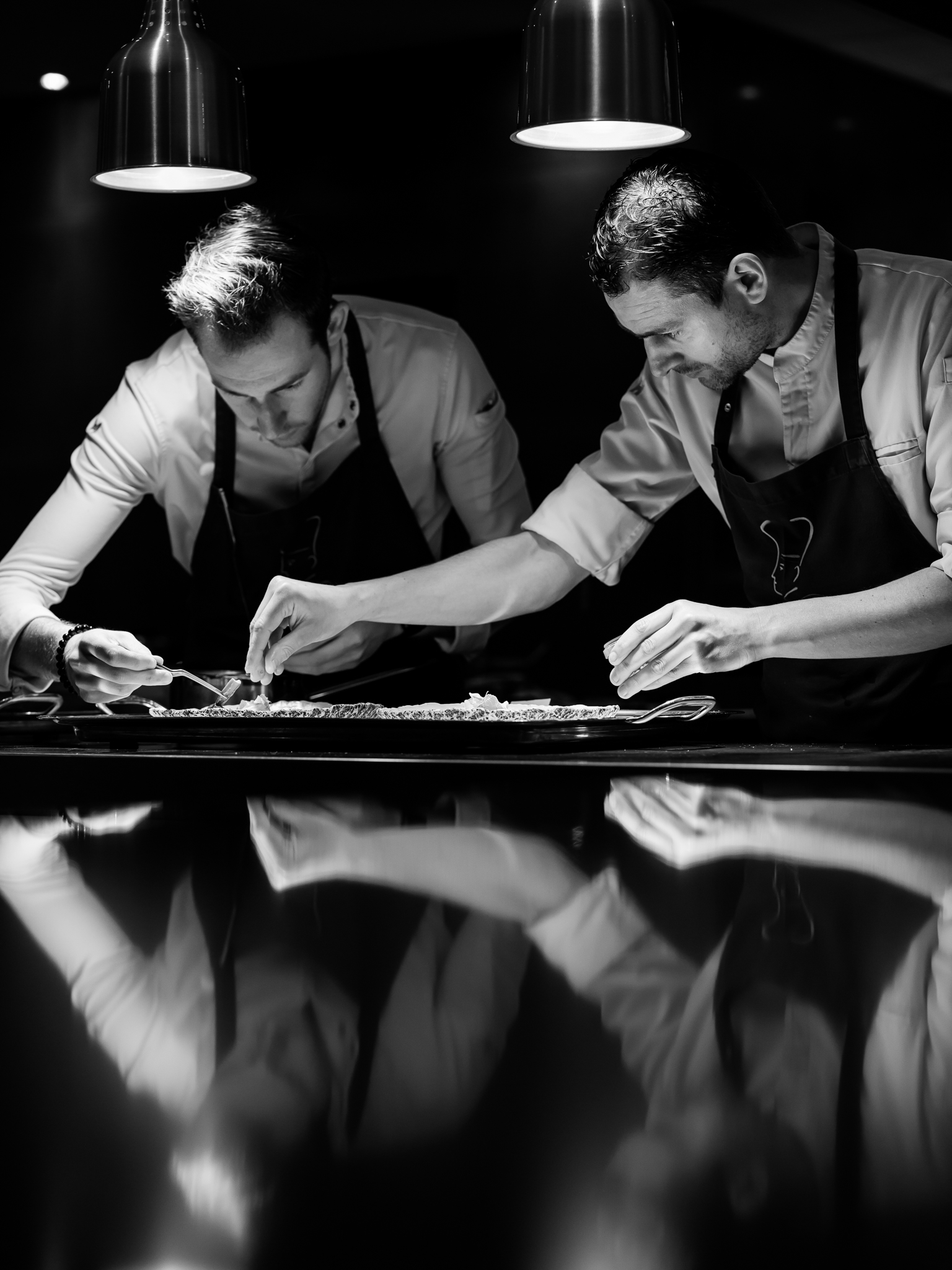 Concentratie tijdens de bordopmaak in de keuken van Calla's